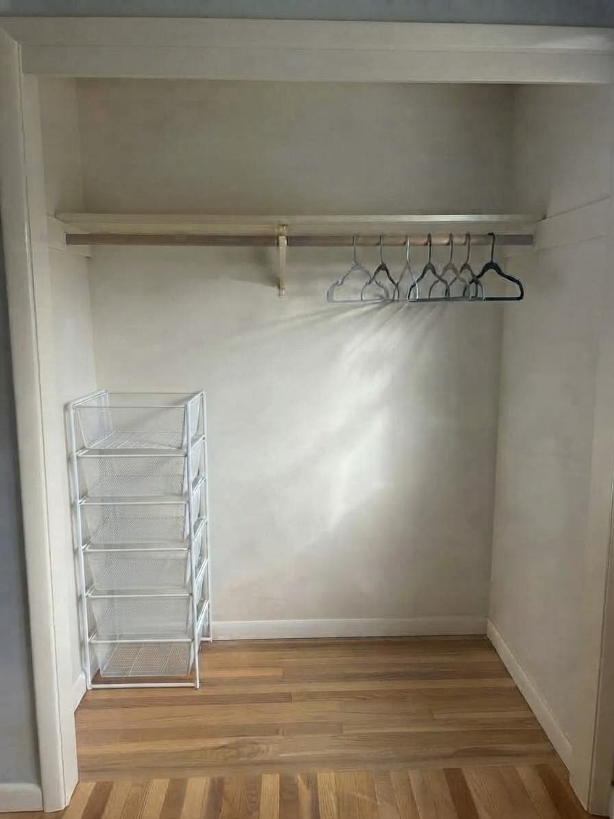 Reach-in closet with a hanging rod and a narrow drawer unit
